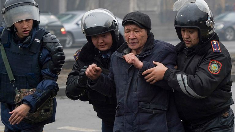 Police officers arrest a protester during a protest in Almaty, Kazakhstan on Wednesday, January 5, 2022. Protesters denouncing the doubling of liquefied gas prices clashed with police in Kazakhstan's largest city and staged protests in a dozen other cities across the country.  (AP Photo / Vladimir Tretiakov) PIC: AP