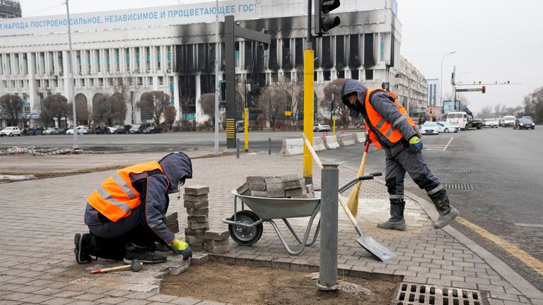 Municipal workers repair the sidewalk at the city hall building in the central square in Almaty, Kazakhstan, Tuesday, Jan. 11, 2022. The president of Kazakhstan announced Tuesday that a Russia-led security alliance will start pulling out its troops from the country in two days after completing its mission. Life in Almaty, which was affected with the violence the most, started returning to normal this week, with public transport resuming operation and malls reopening. (AP Photo)
PIC:AP


