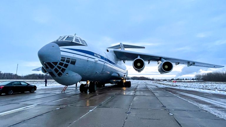 Belarus officials showed a Russian plane with troops on board preparing to leave from an airfield outside Minsk. Pic: AP