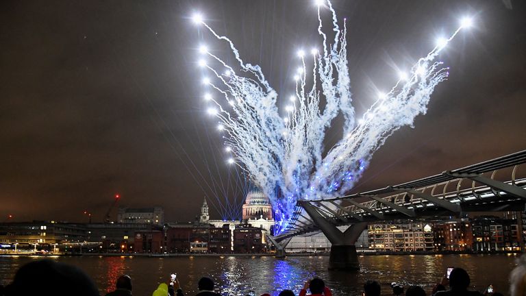 New Year&#39;s Eve celebrations in London
A light display to mark the New Year is seen over St Paul’s Cathedral and the Millenium Bridge, amidst the spread of the coronavirus disease (COVID-19) pandemic, in London, Britain, January 1, 2022. REUTERS/Toby Melville