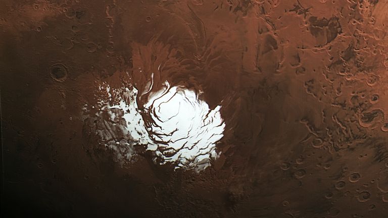 EMBARGOED TO 1400 MONDAY JANUARY 24 Undated handout photo of a view of Mars&#39; south pole. Liquid water previously spotted beneath The planet&#39;s ice-covered south pole may just be an illusion, a new study suggests. In 2018 scientists thought they were looking at water when they saw bright reflections under the polar cap. However, according to new research, the reflections match those of volcanic plains found all across the red planet. Issue date: Monday January 24, 2022.