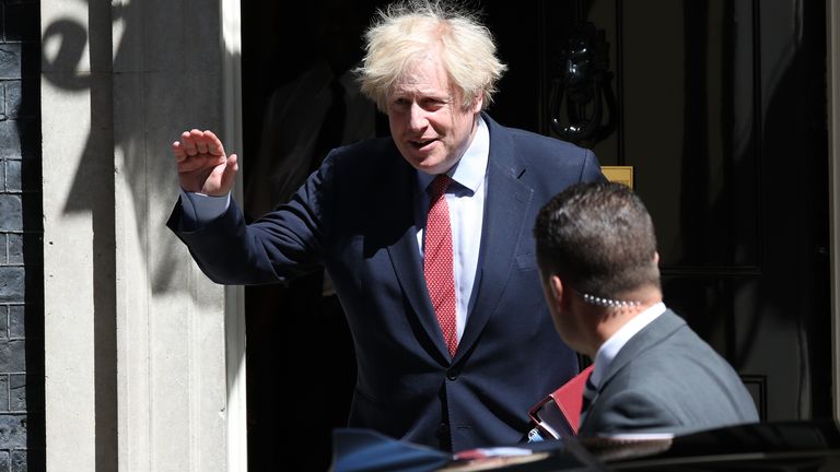 Prime Minister Boris Johnson leaves 10 Downing Street, London, for PMQs in the House of Commons, following the easing of coronavirus restrictions to bring the country out of lockdown. 2020-05-20