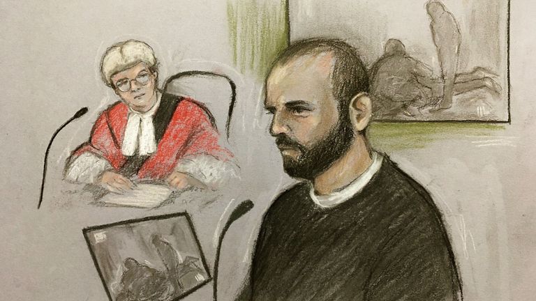A court artist sketch of Smith standing trial