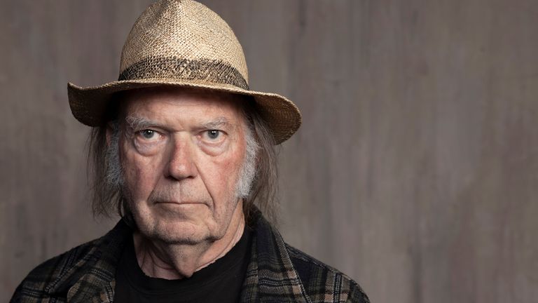 FILE - Neil Young poses for a portrait in Santa Monica, Calif. on Sept. 9, 2019. Spotify says it will grant the veteran rocker's request to remove his music from its streaming platform. Young made the request as a protest to what he called the company's decision to allow COVID-19 misinformation to spread on its service. (Photo by Rebecca Cabage/Invision/AP, File)