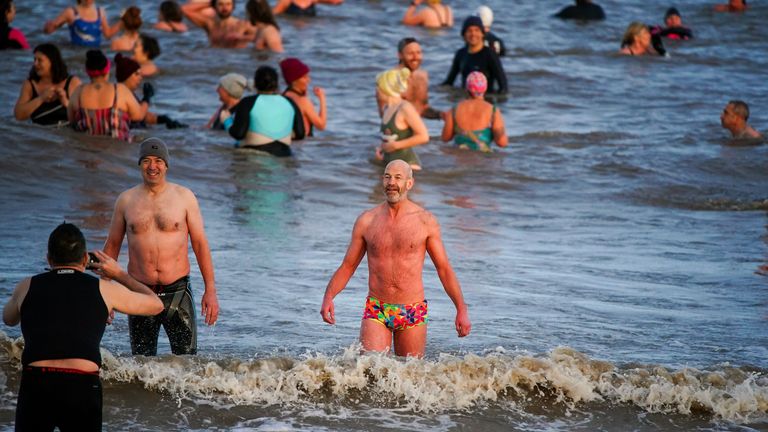 Swimmers take part in the New Year&#39;s Day swim at Derby Pool, New Brighton, Wirral. Picture date: Saturday January 1, 2022.