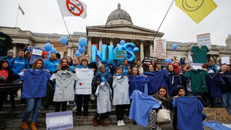NHS staff march in a protest against vaccine mandates, in London
NHS staff protest against the coronavirus disease (COVID-19) vaccine rules, at Trafalgar Square in London, Britain, January 22, 2022. REUTERS/Peter Nicholls