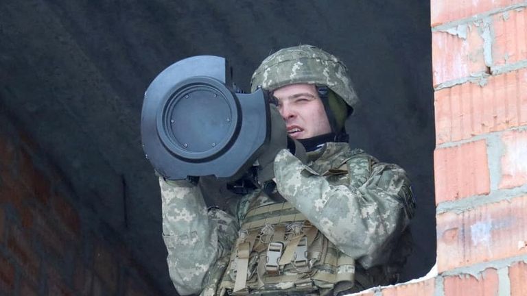 A Ukrainian service member holds a next generation light anti-tank weapon (NLAW), supplied by Britain amid tensions between Russia and the West over Ukraine, during drills in the Lviv region, Ukraine, in this handout picture released January 27, 2022. Press Service of the Ukrainian Ground Forces Command/Handout via REUTERS ATTENTION EDITORS - THIS IMAGE HAS BEEN SUPPLIED BY A THIRD PARTY.
