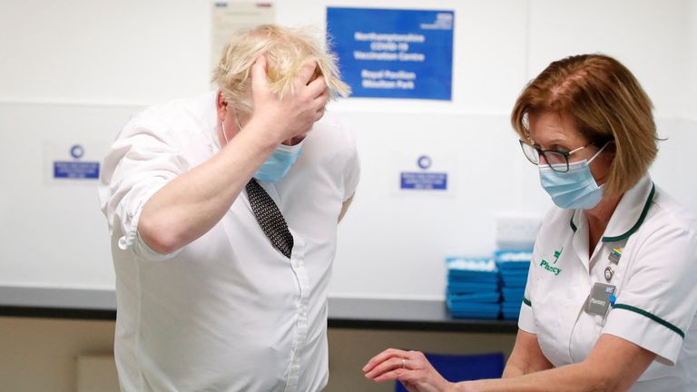 Prime Minister Boris Johnson during a visit to a vaccination centre in Northamptonshire. Picture date: Thursday January 6, 2022.
