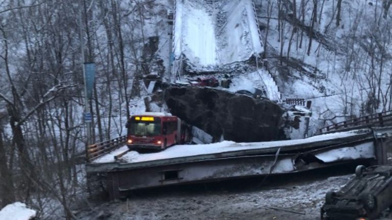 A bus and several cars plummeted into a ravine as a bridge in Pittsburgh collapsed.

Pictures from the Frick Park area show the cracked, snow-covered bridge lying in the ravine, with emergency services on the scene on Friday morning.