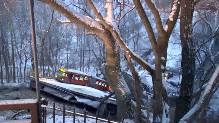 A commuter bus sits upright on a section of a collapsed bridge in Pittsburgh, on Friday, Jan. 28, 2022. Police reported the span, on Forbes Avenue over Fern Hollow Creek in Frick Park, came down around 6 a.m. There were no initial reports of injuries, Pittsburgh Public Safety said on Twitter. (Greg Barnhisel via AP)
PIC:AP

