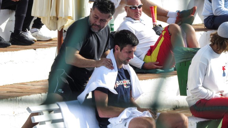 File Photos - Serbian tennis player Novak Djokovic takes a break during training at Puente Romano tennis club in Marbella, Spain on January 2, 2022. Photo taken on January 2, 2022. KMJ-GTRES / Document via REUTERS THIS IMAGE HAS BEEN PROVIDED BY A THIRD PARTY.
