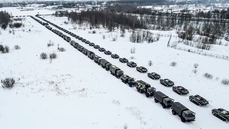 Russian peacekeeping vehicles lined up at an airfield in Russia before being deployed to Kazakhstan. Pic: AP
