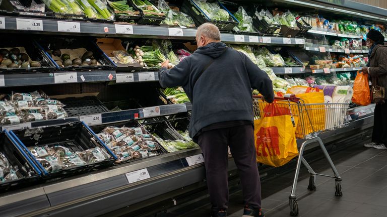 File photo dated 15/10/21 of shoppers in the fruit and vegetables section of a branch of Sainsbury&#39;s in London