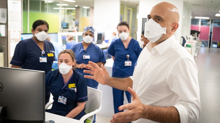 Health Secretary Sajid Javid meets staff in a COVID Intensive Care Unit during a visit to King&#39;s College Hospital in London