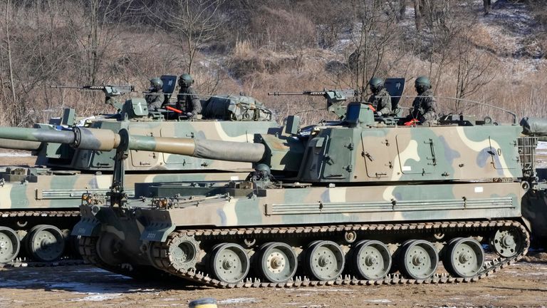 South Korean army soldiers ride K-9 self-propelled howitzers in Paju, near the border with North Korea, South Korea, Tuesday, Jan. 11, 2022. North Korea on Tuesday fired what appeared to be a ballistic missile into its eastern sea, its second launch in a week, following leader Kim Jong Un&#39;s calls to expand its nuclear weapons program in defiance of international opposition. (AP Photo/Ahn Young-joon)
PIC:AP