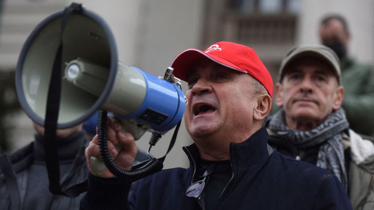 Serbian tennis player Novak Djokovic&#39;s father Srdjan speaks speaks through a megaphone during the protest in front of the National Assembly as the player is fighting in Australia his visa cancellation and pending deportation in a Federal Court challenge in Belgrade, Serbia,  