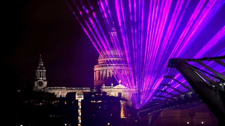 New Year&#39;s Eve celebrations in London
A light display to mark the New Year is seen over St Paul’s Cathedral and the Millenium Bridge, amidst the spread of the coronavirus disease (COVID-19) pandemic, in London, Britain, January 1, 2022. REUTERS/Toby Melville