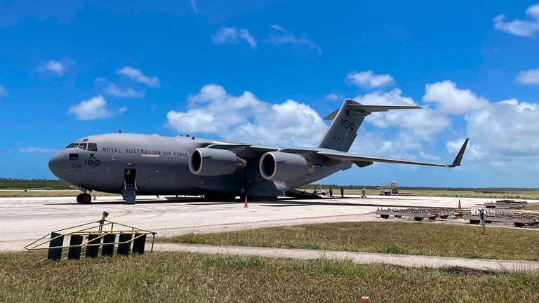Pic: Australian Defence Force/AP

In this photo provided by the Australian Defence Force a Royal Australian Air Force C-17A Globemaster III aircraft is parked at Fua&#39;amotu International Airport near Nuku..alofa, Tonga, Thursday, Jan. 20, 2022.  The first flights carrying fresh water and other aid to Tonga were finally able to land after the Pacific nation&#39;s main airport runway was cleared of ash left by a huge volcanic eruption. 