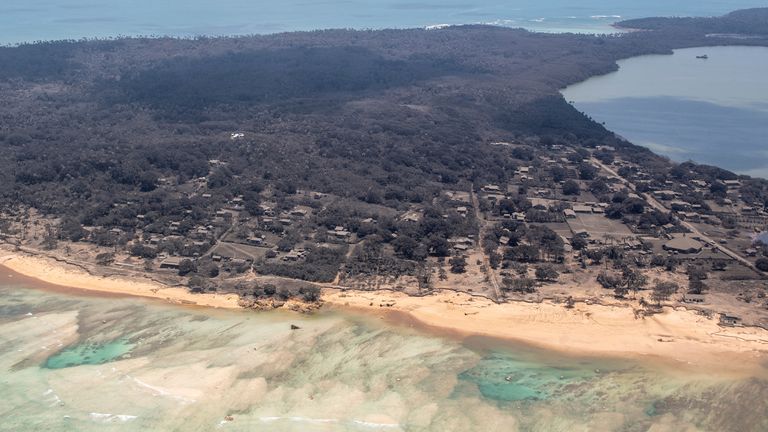 A view from a New Zealand Defence Force surveillance plane shows heavy ash fall over Nomuka in Tonga