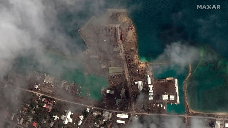 The main port in Nuku’alofa, Tonga, covered in ash, on 18 January, 2022. Pic: Satellite image ©2022 Maxar Technologies