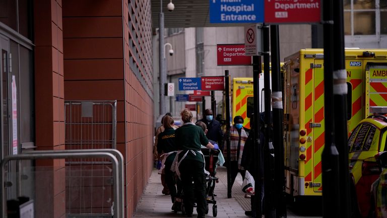 A patient is pushed on a trolley after arriving in an ambulance outside the Royal London Hospital in the Whitechapel area of east London, Thursday, Jan. 6, 2022
PIC:AP