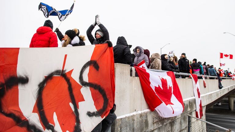 Protestors show their support for the truckers. Pic: AP