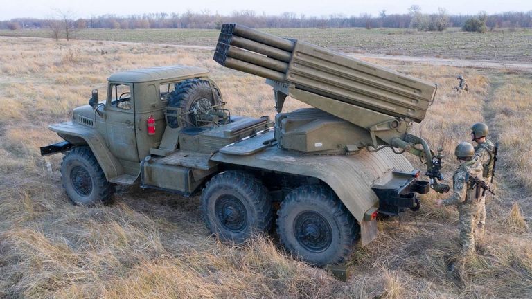 Service members of the Ukrainian Armed Forces gather near a BM-21 &#34;Grad&#34; multiple rocket launcher during tactical military exercises at a shooting range in the Kherson region, Ukraine, January 19, 2022. Picture taken January 19, 2022. Ukrainian Defence Ministry/Handout via REUTERS ATTENTION EDITORS - THIS IMAGE HAS BEEN SUPPLIED BY A THIRD PARTY.
