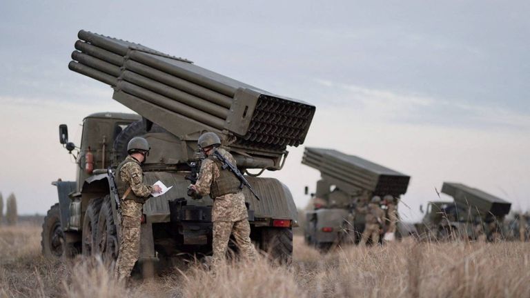 Service members of the Ukrainian Armed Forces gather near BM-21 "Grad" multiple rocket launchers during tactical military exercises at a shooting range in the Kherson region, Ukraine, January 19, 2022. Picture taken January 19, 2022. Ukrainian Defence Ministry/Handout via REUTERS ATTENTION EDITORS - THIS IMAGE HAS BEEN SUPPLIED BY A THIRD PARTY.
