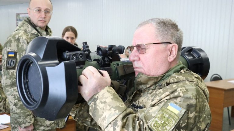 Pavlo Tkachuk, Head of the Hetman Petro Sahaydachnyi National Army Academy, holds the next generation light anti-tank weapon, NLAW, supplied by Britain, during a training for Ukrainian service members in Lviv, Ukraine, in this handout picture released January 25, 2022. Ukrainian Defence Ministry/Handout via REUTERS ATTENTION EDITORS - THIS IMAGE WAS PROVIDED BY A THIRD PARTY.

