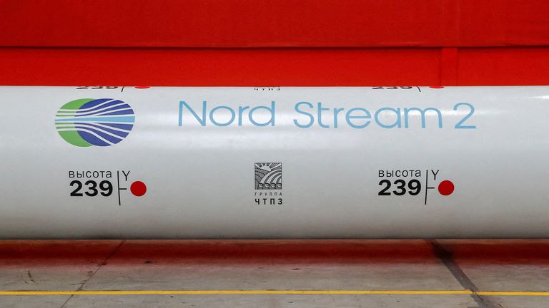 FILE PHOTO: The logo of the Nord Stream 2 gas pipeline project is seen on a large diameter pipe at the Chelyabinsk Pipe Rolling Plant owned by ChelPipe Group in Chelyabinsk, Russia, February 26, 2020. REUTERS/Maxim Shemetov/File Photo
