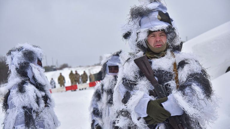 Ukrainian soldiers wrapped up warm for an exercise at the Yavoriv military training ground. Pic: AP