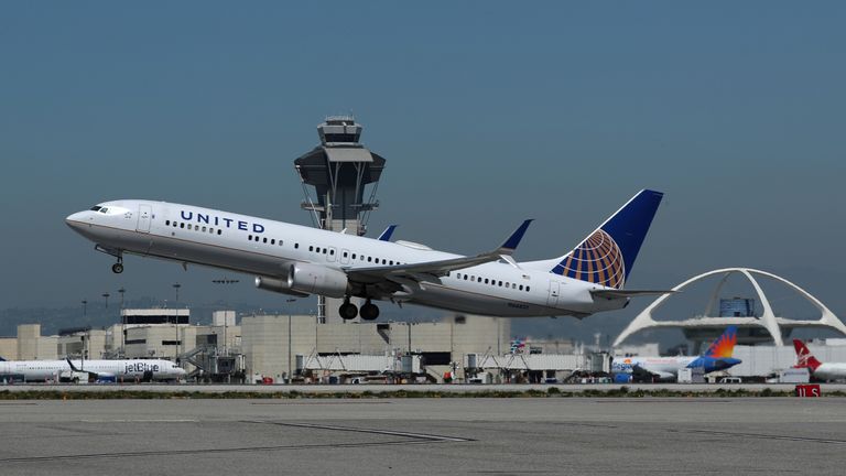 A United Airlines Boeing 737-900ER plane takes off from Los Angeles International airport (LAX) in Los Angeles, California