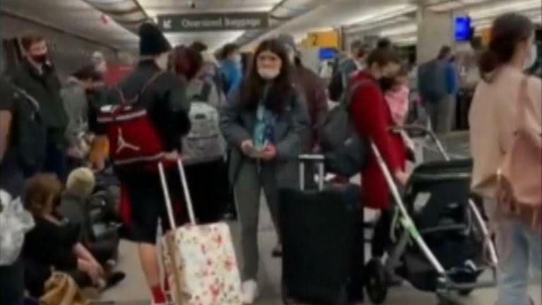 Passengers reported long queues at Denver International Airport as flight delays  tied to COVID-19 and winter weather continued.