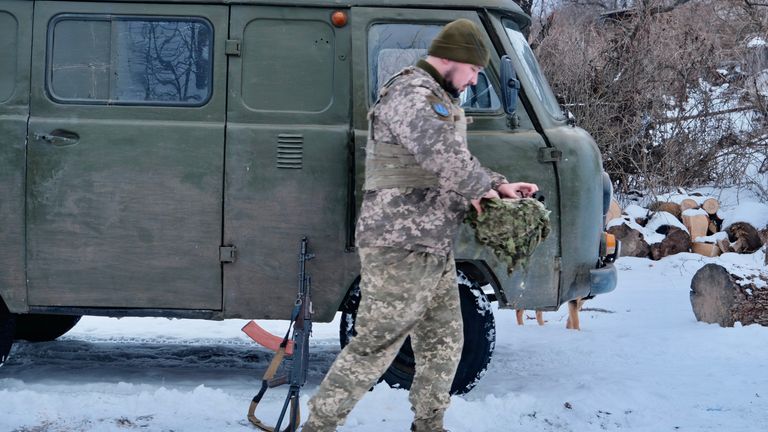 Lieutenant Viktor Bieliekov and a converted ambulance