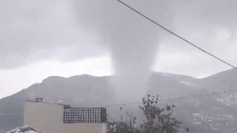 Waterspout swirls over Greek island during rare snowfall