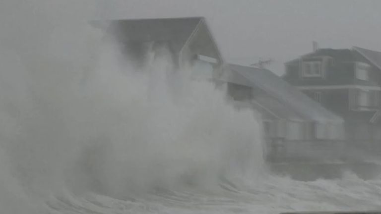 Massive waves crash into houses in Massachusetts