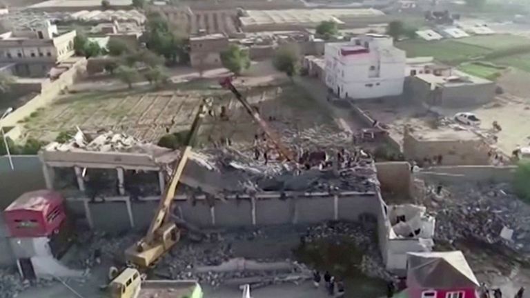 The damage caused by the air strike on the temporary detention center can be seen in this real image from the video taken on January 21, 2022 in Saada, Yemen. Video with a drone. THIS PICTURE WAS PROVIDED BY THIRD PARTY THROUGH Al Masirah TV / REUTERS TV REUTERS