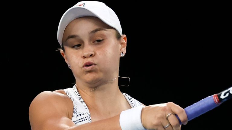 Ashleigh Barty of Australia plays a forehand return to Danielle Collins of the U.S. during the women&#39;s singles final at the Australian Open tennis championships in Saturday, Jan. 29, 2022, in Melbourne, Australia. (AP Photo/Hamish Blair)