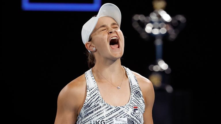Ashleigh Barty of Australia celebrates after defeating Danielle Collins of the U.S., in the women&#39;s singles final at the Australian Open tennis championships in Saturday, Jan. 29, 2022, in Melbourne, Australia. (AP Photo/Hamish Blair)
