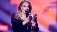 Adele receives the award for Song of the Year at the Brit Awards at the O2 Arena in London, Britain, February 8, 2022 REUTERS/Peter Cziborra
