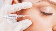 Close up of woman receiving beauty treatment with botox. 