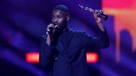 Dave receives the award for Hip Hop/Rap/Grime Act at the Brit Awards at the O2 Arena in London, Britain, February 8, 2022 REUTERS/Peter Cziborra