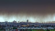 Glasgow, Scotland, UK 17th February, 2022. UK Weather: Rain returned with high winds as as  the beginnings of Storm Dudley and Storm Eunice sweep in over the city as shower curtains are visible ominously hanging over the west end and the Gothic skyline . Credit Gerard Ferry/Alamy Live News
