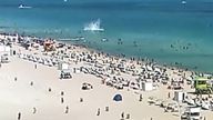 A video showed the aircraft plunging into the water close to a busy area of beachgoers