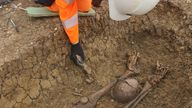 Around 40 beheaded skeletons are among 425 bodies exhumed by HS2 archaeologists after being found in a large Roman cemetery in Fleet Marston near Aylesbury, Buckinghamshire.