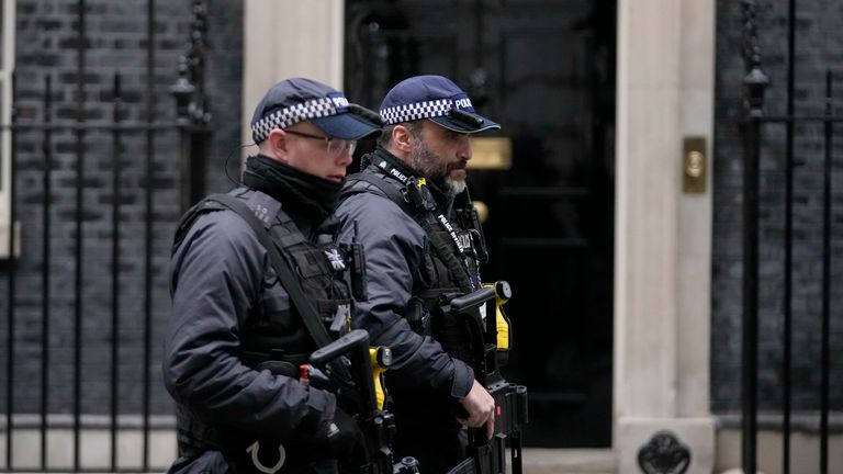 Armed police forces patrol in front of 10 Downing Street in London, Wednesday, Jan. 26, 2022. Britain&#39;s Prime Minister Boris Johnson is bracing for the conclusions of an investigation into allegations of lockdown-breaching parties, a document that could help him end weeks of scandal and discontent, or bring his time in office to an abrupt close. (AP Photo/Matt Dunham)

PIC:AP

