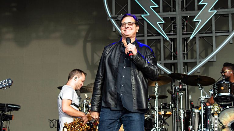 Actor/comedian Bob Saget performs with The Revivalists during KAABOO 2019 at the Del Mar Racetrack and Fairgrounds on Sunday, Sept. 15, 2019, in Del Mar, Calif. (Photo by Amy Harris/Invision/AP)
