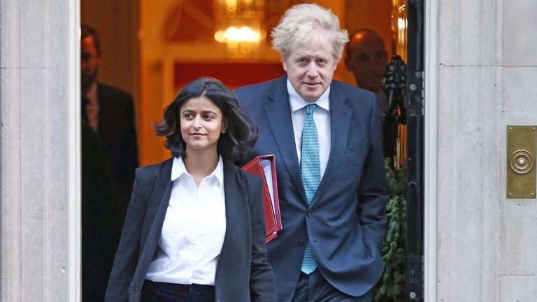 File photo dated 15/12/2020 of Prime Minister Boris Johnson walking out of his official residence in London&#39;s Downing Street with Munira Mirza, Director of the Number 10 Policy Unit, who has resigned after the PM failed to apologise for using a "scurrilous" Jimmy Savile slur against Sir Keir Starmer. Issue date: Thursday February 3, 2022.
