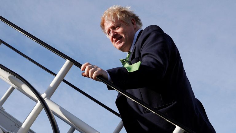 Prime Minister Boris Johnson boards an aircraft in London, for a flight to Kyiv