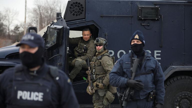 Police officers pictured after clearing demonstrators, during the protest in Windsor, Ontario